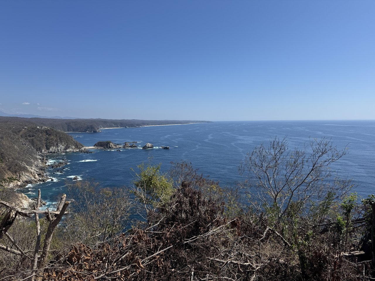 Cliffs and blue ocean on the Oaxaca coast