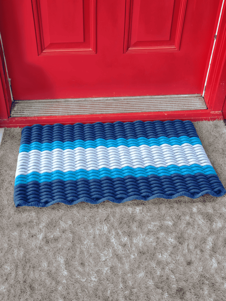 blue and with striped doormat made of rope